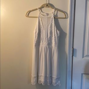 Francescas white lace dress.